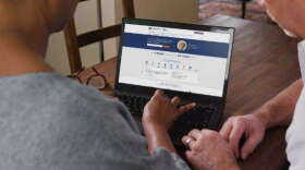 A couple uses the "benefits check-up" tool to find extra assistance on the National Council on Aging website. (National Council On Aging/ Courtesy)