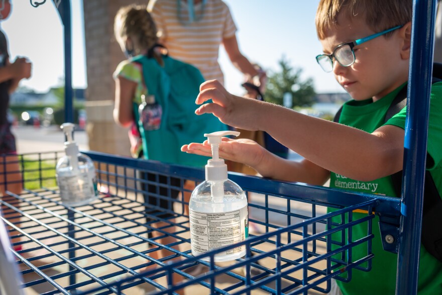 Students arrive for the first day of school Aug. 24, 2020, at Duello Elementary School, in Lake St. Louis. Wentzville is one of the few St. Louis-area school districts to open in person. It'll offer in-school instruction two days per week.