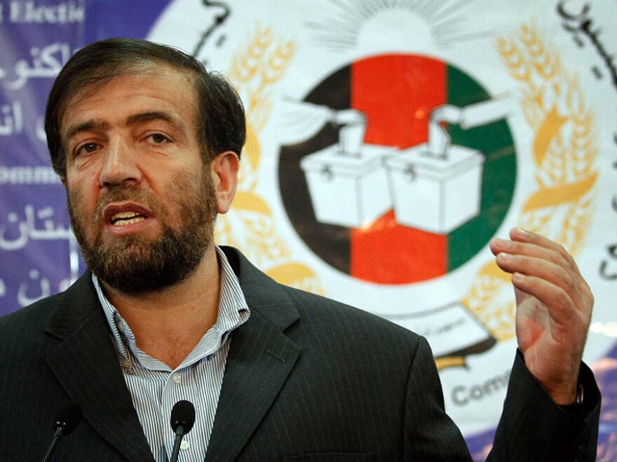 Afghanistan's Election Commission Chairman Fazel Ahmad Manawi, shown during a news conference earlier this year, told reporters this week that the election had "shortcomings," but called it "a great success for the people of Afghanistan."