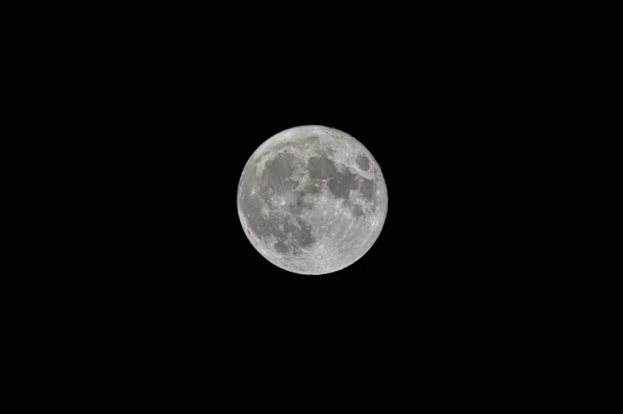 Saturday night, the full moon will be a 'mini moon' and be as far away from the Earth as it gets.