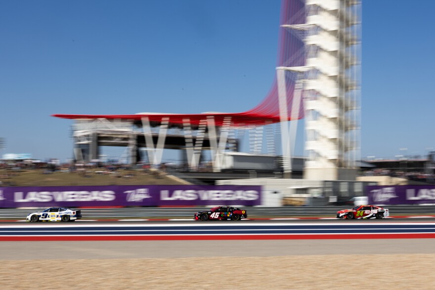 From left, Chase Elliott, Tyler Reddick and William Byron race past the tower at Circuit of the Americas.