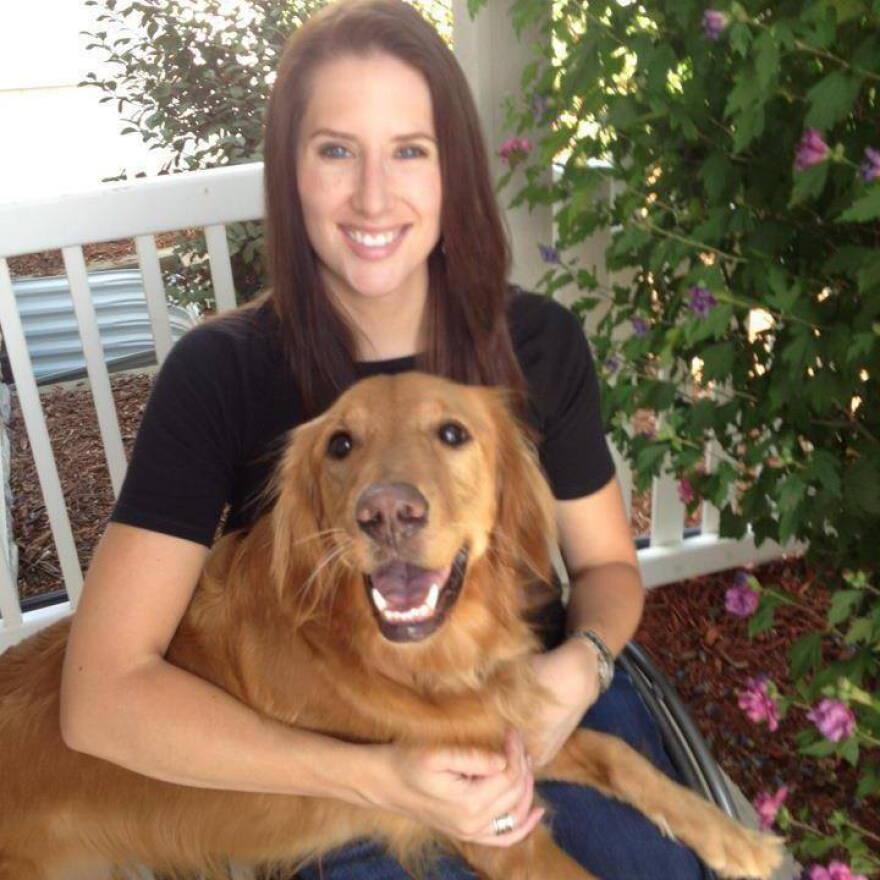Columbine High School shooting survivor Anna Marie Hochhalter with her dog, Sadie. (Courtesy/Anna Marie Hochhalter)