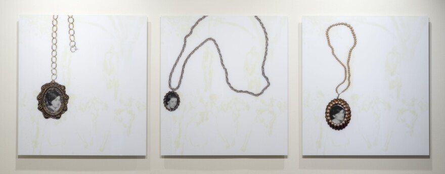 The three faces that appear in Kerry James Marshall's 2002 <em>Heirlooms and Accessories</em> are taken from a 1930 photograph of a double lynching in Marion, Ind. You can hear Marshall talk about this work<strong> <a href="https://vimeo.com/45605233">here.</a></strong>