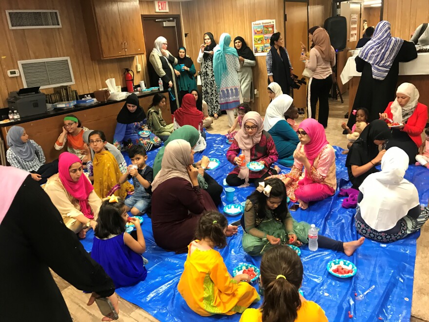 Families breaking their fast in the trailer turned mosque in Victoria, Texas. The mosque was burned down in an apparent hate crime in 2017.