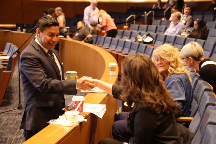 Secretary of State Diego Morales, left, at the 2025 National Election Conference in June 2025. After taking heat for back-to-back international trips, other Republicans are lining up to challenge the incumbent in 2026.