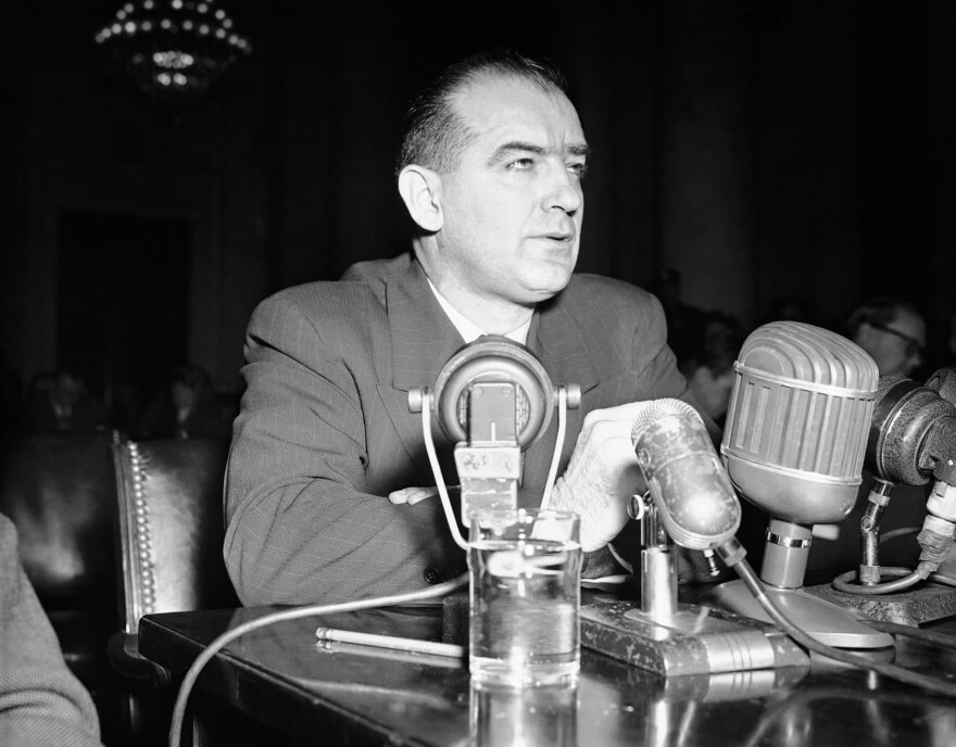 Sen. Joseph R. McCarthy (R-Wisc.) testifies in Washington, March 8, 1950, before a Senate foreign relations subcommittee named to hear his charges that Communists have infiltrated the State Department. McCarthyism gave rise to a wave of anti-LGBT discrimination in government known as the "lavender scare." (Herbert K. White/AP)
