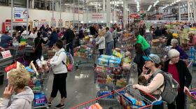 Photo of long checkout lines at Costco.
