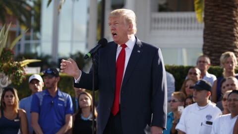 Donald Trump speaks at his National Doral golf club in Florida. He repeatedly showcased his properties and hotels throughout the presidential campaign.