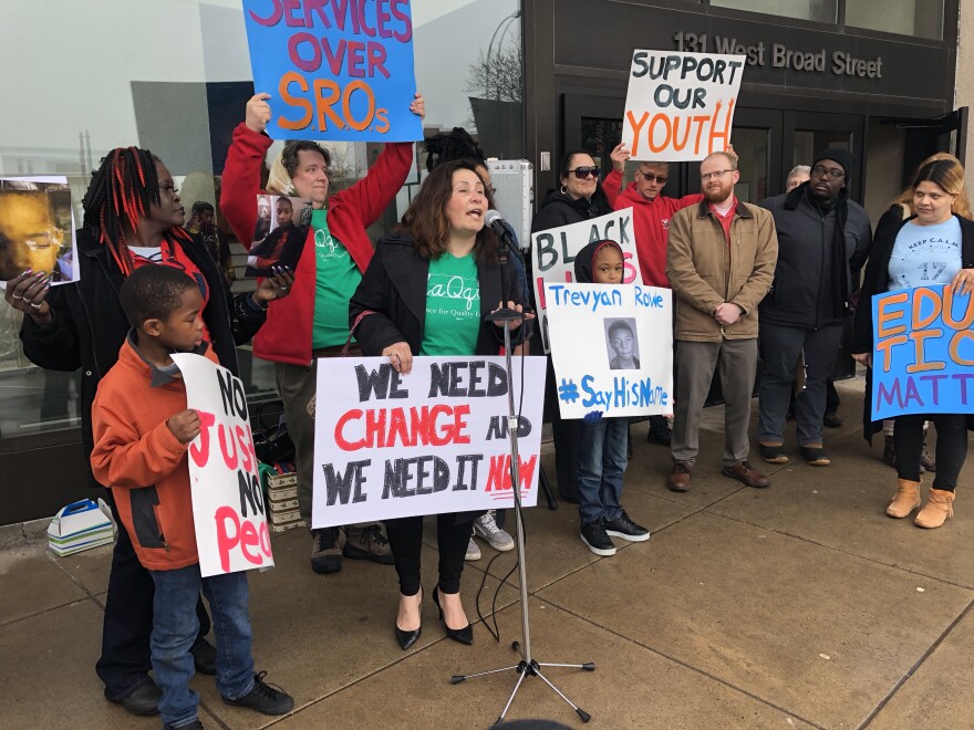 At a protest, parent and advocate Ana Casserly speaks out for families of students with disabilities.