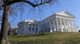 Visitors mill around the Virginia State Capitol in Richmond, Va., Jan. 8, 2020.