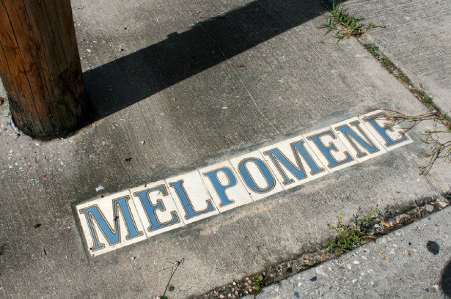 How do New Orleanians pronounce the street name Melpomene?