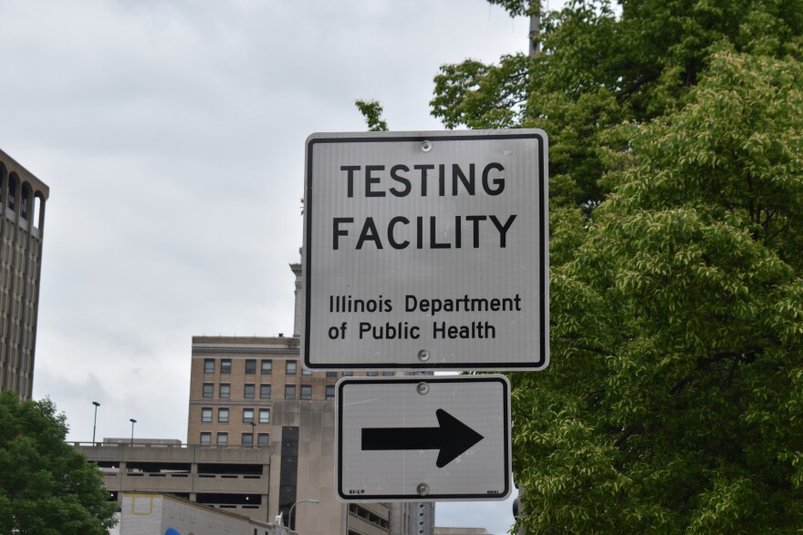 A sign on Main Street in downtown Peoria directing people to the IEMA COVID-19 testing site set up in the Peoria Civic Center Fulton St. parking lot. 