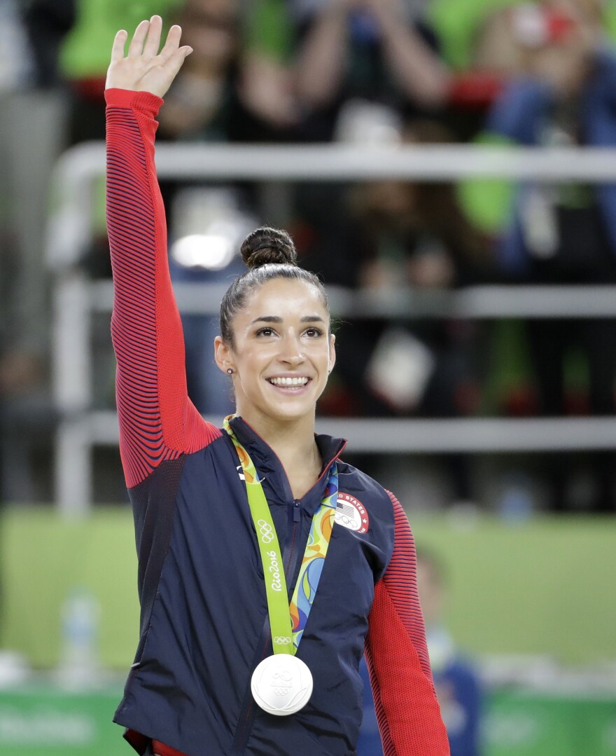 Six-time Olympic medalist Aly Raisman names the U.S. Olympic Committee and USA Gymnastics in a lawsuit this week alleging the organizations hid abuse by disgraced team doctor Larry Nassar.