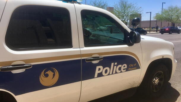 A Phoenix Police Department SUV parked
