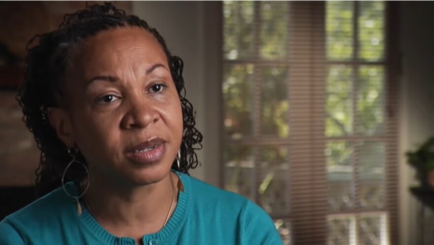  In a 2011 video, author Joy DeGruy relates a story about being treated differently at a store because of her race, and how a lighter-skinned family member spoke up for her.