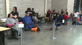 People get haircuts during the 2020 Homeless Connect event.