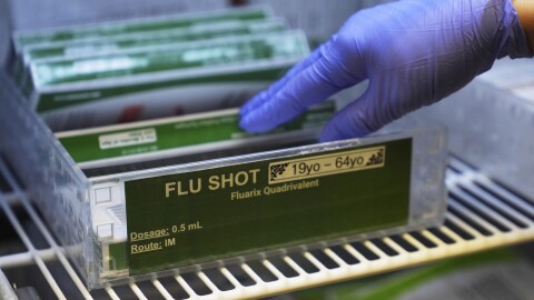 Boxes of Fluarix flu vaccines are seen in storage at International Community Health Services, Wednesday, Sept. 10, 2025, in Seattle.