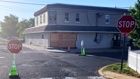 a photo showing additional stop signs and the aftermath of a motor vehicle accident that damaged the Tonya Keller Community Center