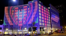 The Indianapolis Power & Light Company downtown headquarters is light up following a light display, Wednesday, March 25, 2020, in Indianapolis. The light display presentation illuminates love and hope to the world from the heart of Downtown Indianapolis. Gov. Eric Holcomb ordered state residents to remain in their homes to slow the spread of COVID-19.