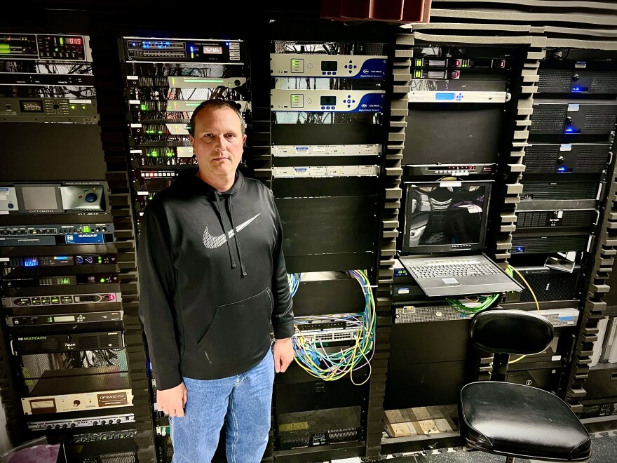 Tim Boll midshot in front of technology