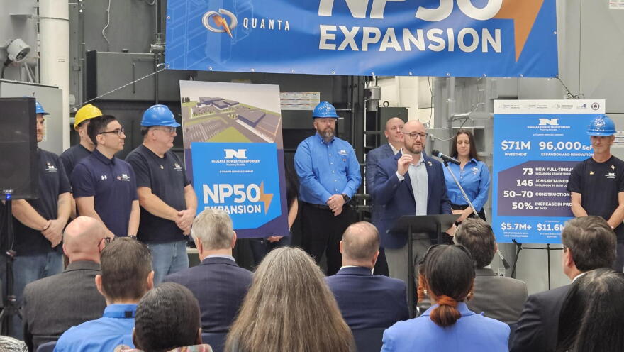 National Power Transformer President Chris Kraft, standing at lectern, outlines the importance of a new $71 million investment.