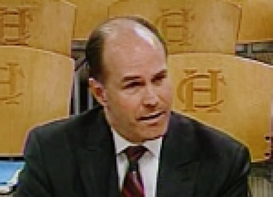 City Treasurer Randall Landes warns the Finance and Audit Committee of a probable bond rating downgrade.