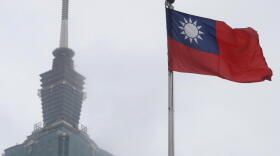 A Taiwan national flag flutters near the Taipei 101 building at the National Dr. Sun Yat-Sen Memorial Hall in Taipei, Taiwan, May 7, 2023. (Chiang Ying-ying/AP)
