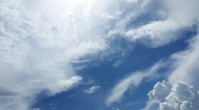 Clouds against a blue sky