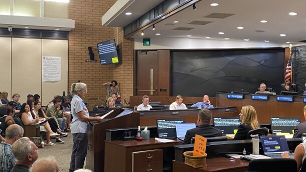 Residents take turns on the mic at the Chico City Council meeting in Chico, Calif. on Aug. 18, 2026.