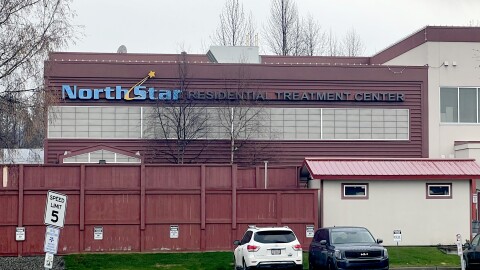 A maroon building with blue lettering that says "North Star Residential Treatment Center"