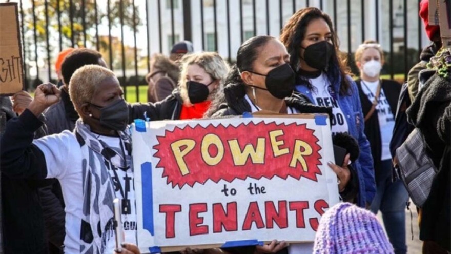 Tenant activists calling for regulation of rent hikes outside the White House. (Photo courtesy - Shedrick Pelt / Courtesy Of People's Action)