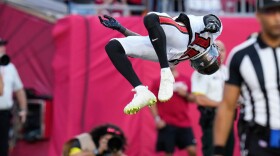 Bucs rookie receiver Tez Johnson does a flip in the end zone to celebrate his first career touchdown reception during the second half of Tampa Bay's 30-19 win against the San Francisco 49ers, Sunday, Oct. 12, 2025. 