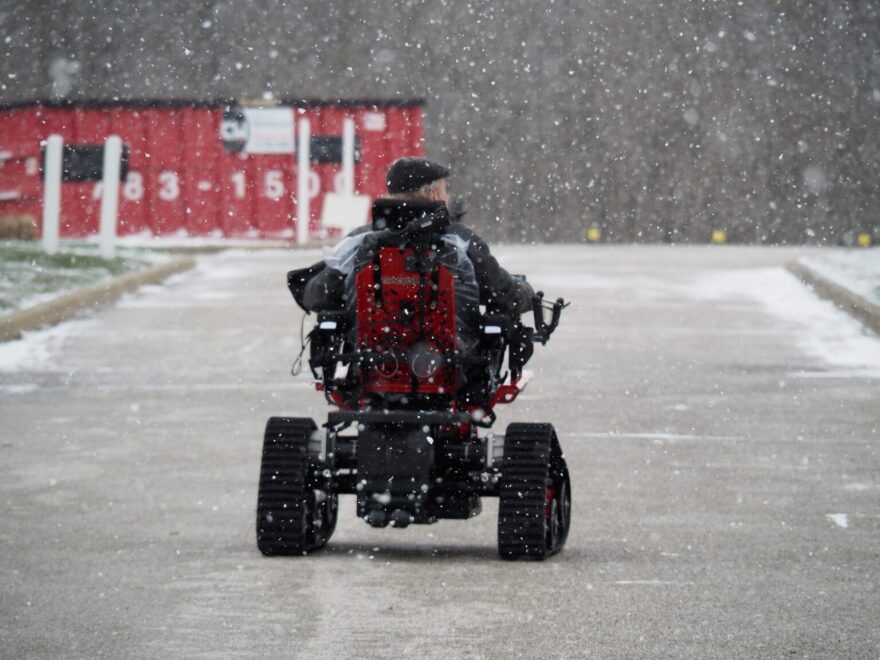 Jeremy Warriner, the founder of disability advocacy group Walking Spirit, takes a ceremonial first ride in a new all-terrain chair on Tuesday, March 17, 2026, in Indianapolis