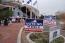 Voters walk outside the Fairfax County Government Center during early voting for the Virginia redistricting referendum, Friday, April 3, 2026, in Fairfax, Va.