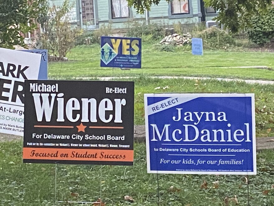 Signs for school board candidates in Delaware, Ohio.