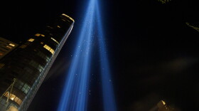 Two beams rise in the footprints of the Twin Towers in New York City. 