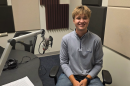 Gavin Kornack at the mic in NPR Illinois Studio F.