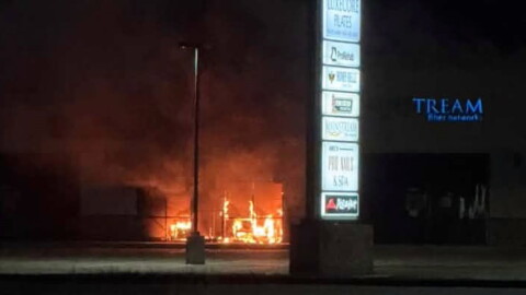 Flames shoot from a strip mall in the 8800 block of High Pointe Drive in Newburgh, Oct. 29, 2026