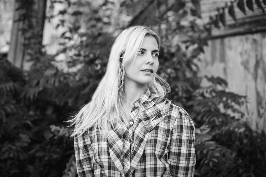 a woman posing for a photograph 