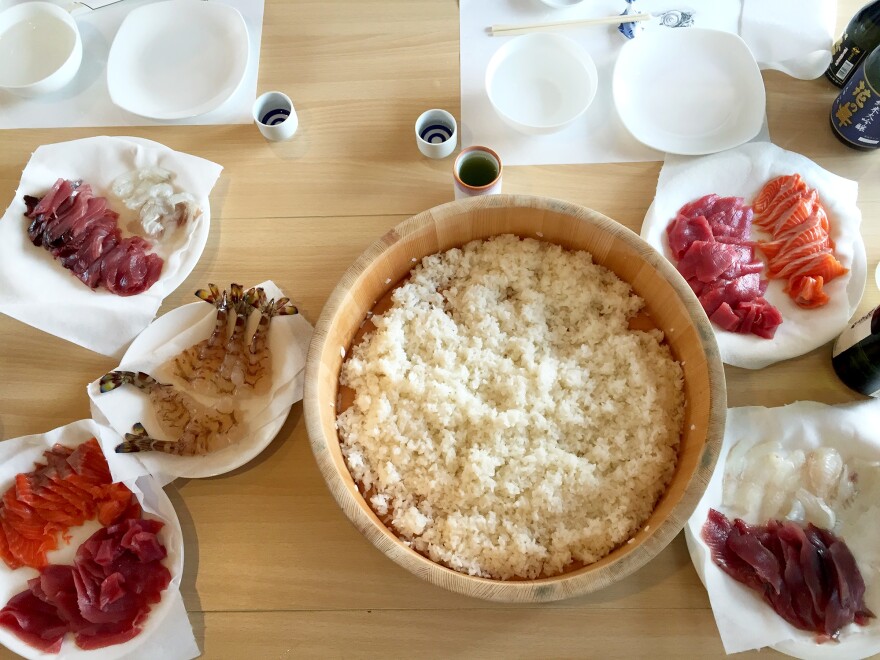 Set up for a hands-on sushi class: wild salmon, wild flounder, prawns, Pacific bluefin tuna, sushi rice and chilled sake.