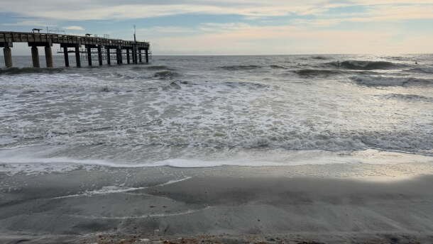 Photo of rough surf along St. Augustine Beach.