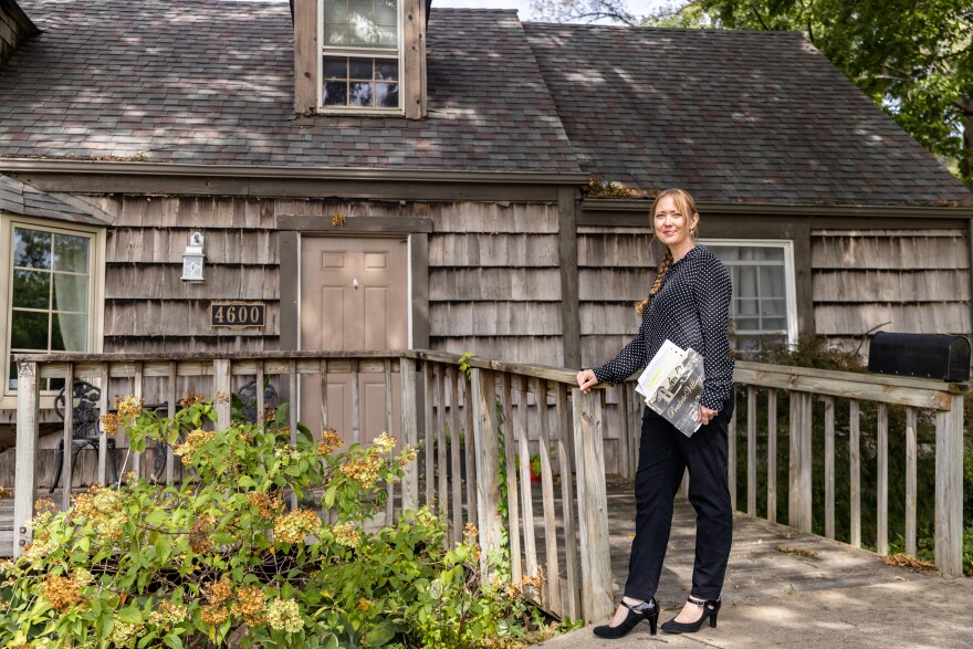 Councilwoman Inga Selders stands in front of her childhood home where she currently lives with her family in Prairie Village, Kan. Selders stumbled upon a racially restrictive housing covenant<strong> </strong>in her homeowners association property records.