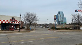 Foreground Big Boy Restaurant at 407 Pearl St., NW., background City of Grand Rapids Dash parking lots.