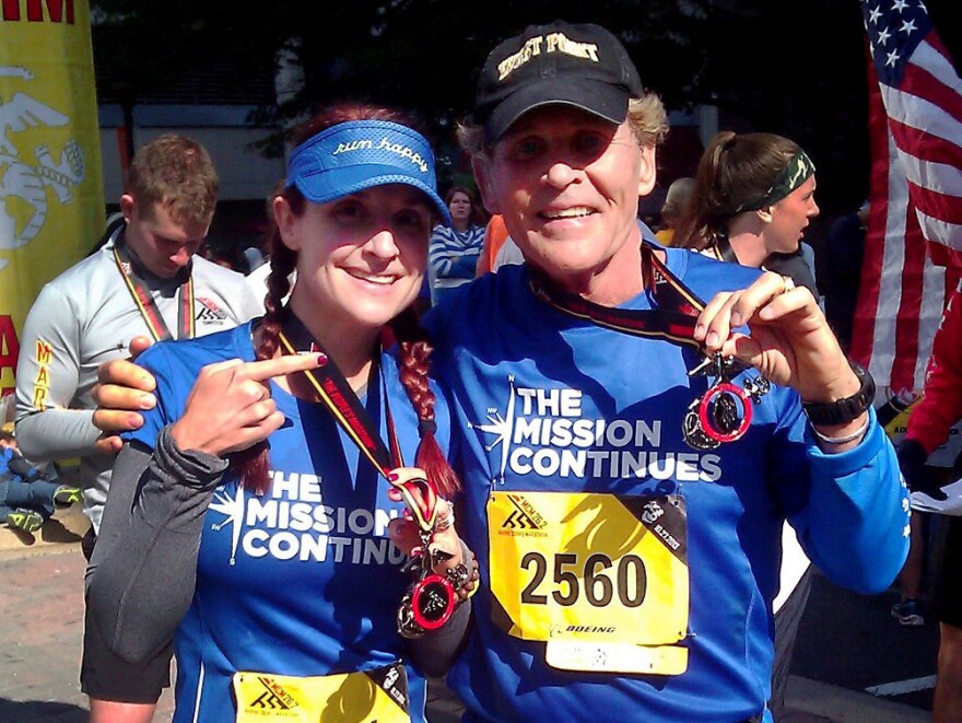 Demi Clark and her father, Howard Kympton, celebrate after running the Marine Corps Marathon in October. A family proud of its military heritage, they ran in support of an organization called <a href="https://www.missioncontinues.org/">The Mission Continues</a> that matches veterans with service projects in the United States. Demi's brother Spencer Kympton helps run the charity.