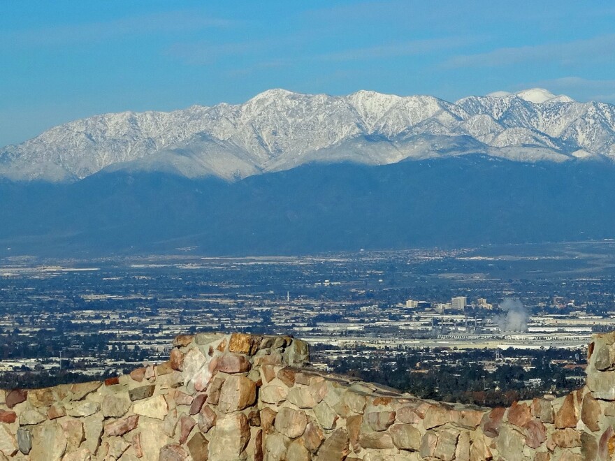 Scenic photo of Inland Empire with the San Gabriel Mountains in the background.