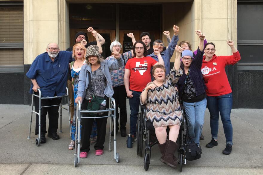 Tiki Apartments residents and supporters after a Tacoma City Council meeting on April 26. Courtesy of Tiki Tenants Organizing Committee