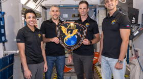 The four members of NASA’s SpaceX Crew-13 mission to the International Space Station display their mission plaque inside a training mockup of a space station module. From left are, Commander Jessica Watkins and Pilot Luke Delaney, both from NASA, and Mission Specialists Joshua Kutryk of CSA (Canadian Space Agency) and Sergey Teteryatnikov of Roscosmos.