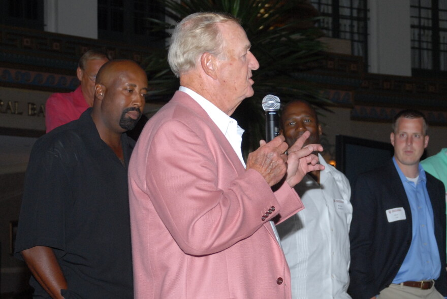 Indiana basketball coach Mike Woodson, left, looks on as former IU standout Bob Leonard speaks at a men's basketball reunion in 2008 in French Lick.