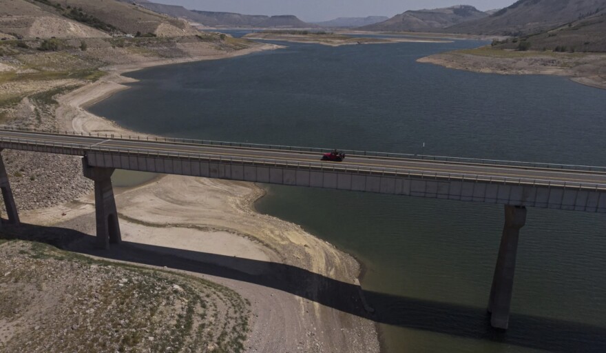 Summer traffic and boaters navigate the U.S. Highway 50 bridge over Blue Mesa in this September 2021 file photo.