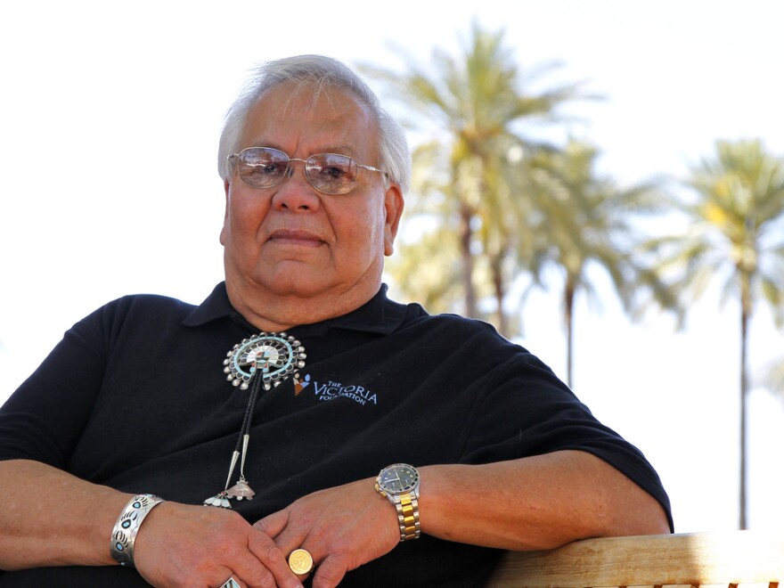 Jim Shee, shown in Scottsdale, Ariz., on Friday, says he has been stopped twice by police and asked for his papers. "I'm an American citizen and I am being stopped because of the color of my skin, what I look like," he says.